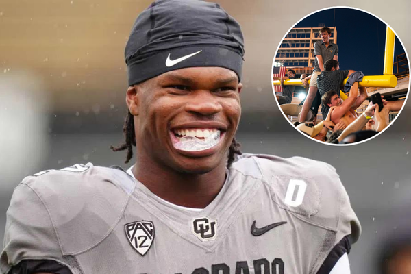 Travis Hunter, Vanderbilt fans sotrming the field after win over Alabama