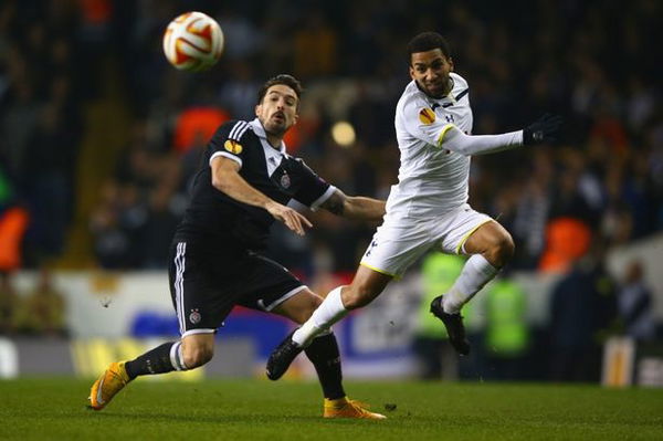 Vladimir-Volkov-of-Partizan-Belgrade-and-Aaron-Lennon-of-Spurs-battle-for-the-ball