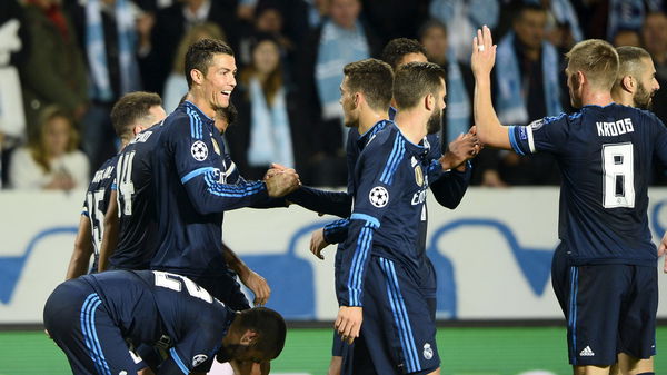 Real Madrid&#8217;s Ronaldo celebrates with teammates after scoring the opening goal against Malmo FF during their Champions League group A soccer match at Malmo New Stadium in Malmo