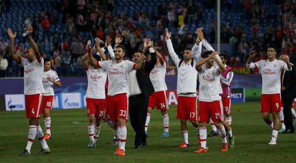 Benfica&#8217;s players celebrate victory over Atletico Madrid at the end of their Champions League group C soccer match in Madrid