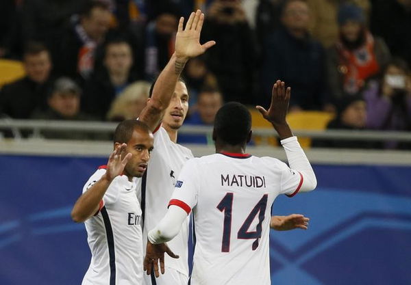 Paris St Germain&#8217;s Ibrahimovic celebrates with his team mates Lucas and Matuidi after scoring against Shakhtar Donetsk during their Champions League group A soccer match at Arena Lviv stadium in Lviv