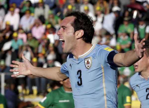 Diego Godin of Uruguay celebrates after scoring against Bolivia during their 2018 World Cup qualifying soccer match in La Paz