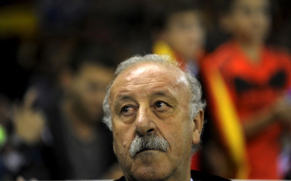 Spain coach Vicente del Bosque listens to the national anthem before their Euro 2016 Group C qualification soccer match against Luxembourg in Logrono