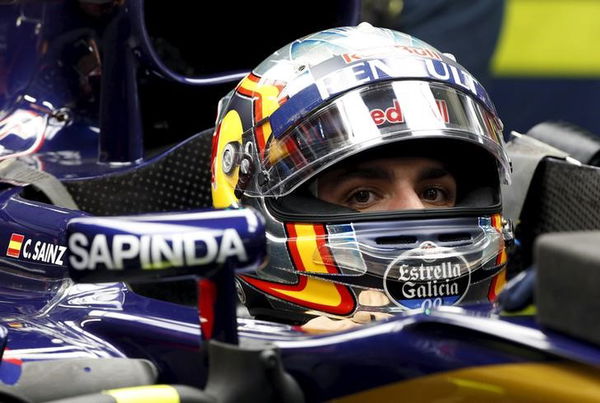 Toro Rosso Formula One driver Carlos Sainz of Spain sits in his car during the second practice session of the Russian F1 Grand Prix in Sochi