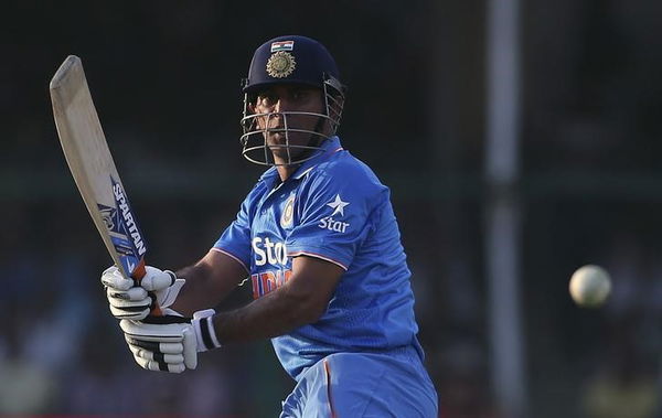 India&#8217;s captain Dhoni plays a shot during their first one-day international cricket match against South Africa in Kanpur