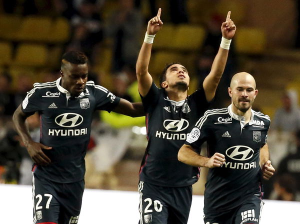 Lyon&#8217;s Rafael Da Silva celebrates after scoring against Monaco during their French Ligue 1 soccer match at Louis II stadium in Monaco