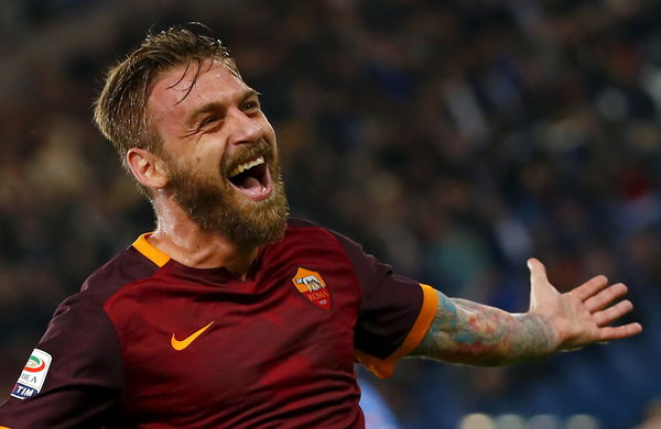 AS Roma&#8217;s De Rossi celebrates after scoring against Empoli during their Italian Serie A soccer match at the Olympic stadium in Rome