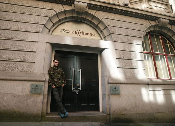 Homeless campaigner Wesley Hall stands outside the former stock exchange building in Manchester northern Britain