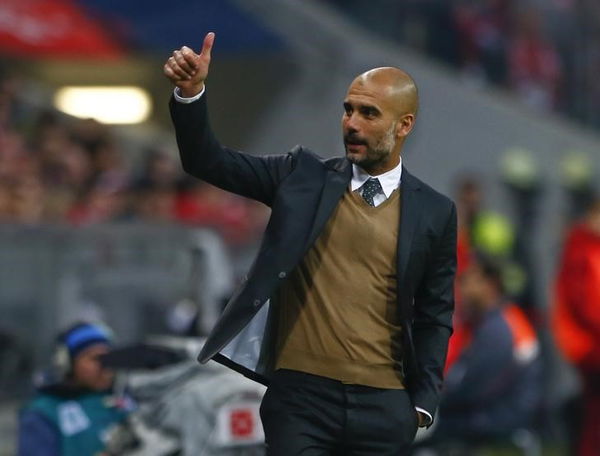 Bayern Munich&#8217;s coach Guardiola reacts during their German first division Bundesliga soccer match against Borussia Dortmund in Munich