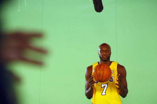Los Angeles Lakers&#8217; Lamar Odom prepares for a TV interview during the NBA basketball team&#8217;s media day in Los Angeles