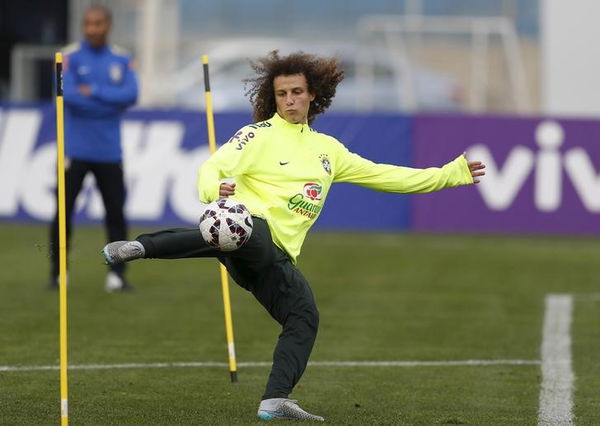 Luiz attends a training session in Santiago, Chile