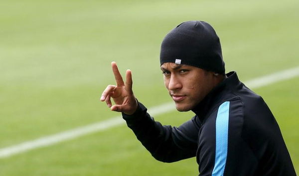 Barcelona&#8217;s Neymar gestures as he arrives for a training session at Joan Gamper training camp, near Barcelona