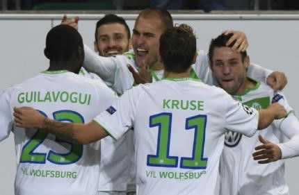 Wolfsburg&#8217;s Dost celebrates his goal against PSV Eindhoven during their Champions League group B soccer match in Wolfsburg