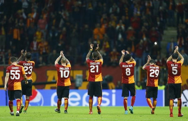 Galatasaray&#8217;s players celebrate winning their Champions League Group C soccer match against Benfica at the Ali Sami Yen stadium in Istanbul