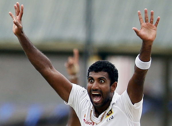 Sri Lanka&#8217;s Prasad appeals for an unsuccessful LBW wicket for West Indies&#8217; Marlon Samuels during the second day of their second test cricket match in Colombo