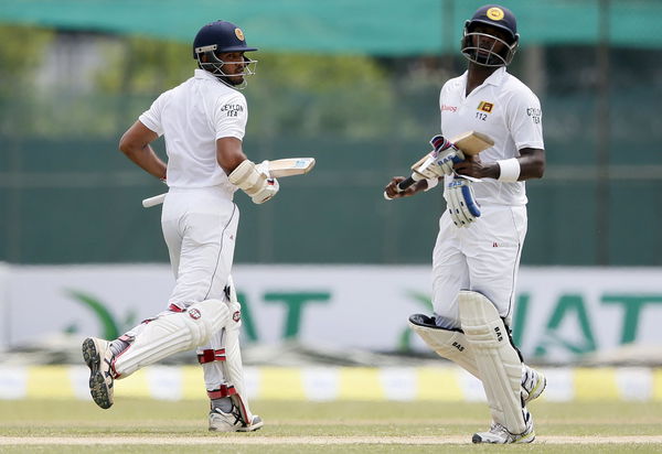 Sri Lanka&#8217;s Siriwardana and captain Mathews run between wickets during the third day of their second test cricket match against West Indies in Colombo