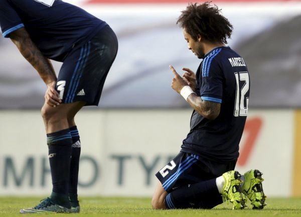 Real Madrid&#8217;s Marcelo celebrates his goal against Celta Vigo during their Spanish first division soccer match at Balaidos stadium in Vigo