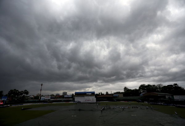 Dark clouds gather overhead as the match was stopped due to rain on the third day of the second test cricket match between Sri Lanka and West Indies in Colombo