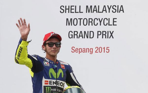 Yamaha MotoGP rider Rossi of Italy waves after placing third in the Malaysian Motorcycle Grand Prix at Sepang International Circuit