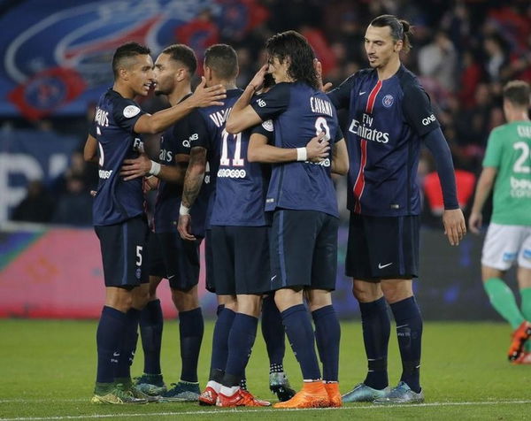 Paris St Germain&#8217;s Ibrahimovic celebrates with his team mates after scoring against Saint-Etienne during their French Ligue 1 soccer match at the Parc des Princes stadium in Paris