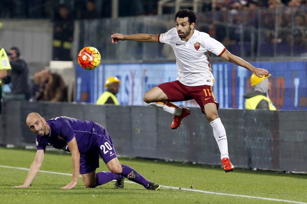 AS Roma&#8217;s Salah and Fiorentina&#8217;s Borja Valero fight for the ball during their Serie A soccer match in Florence