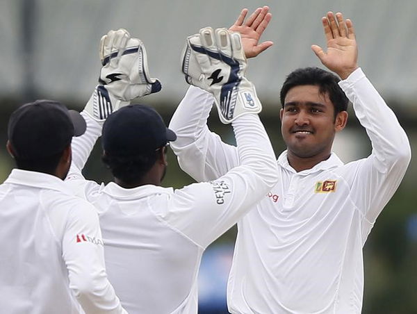 Sri Lanka&#8217;s Siriwardana celebrates with his teammates after taking the wicket of West Indies&#8217; Blackwood during the final day of their second test cricket match in Colombo