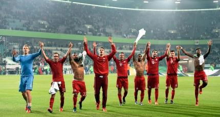 Munich players celebrates winning their German cup (DFB Pokal) second round soccer match against VfL Wolfsburg