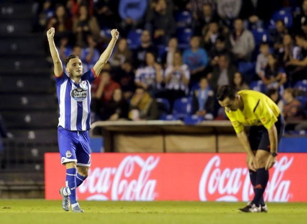 Deportivo Coruna&#8217;s Lucas celebrates his goal against Atletico Madrid during their Spanish First Division soccer match at Riazor stadium in Coruna, Spain