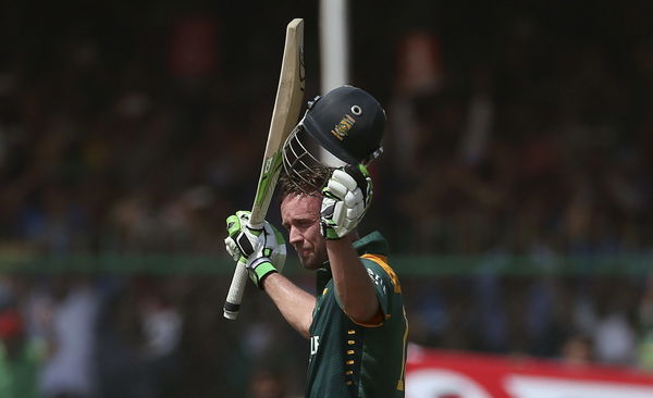 South Africa&#8217;s Villiers celebrates after completing his century during their first one-day international cricket match against India in Kanpur