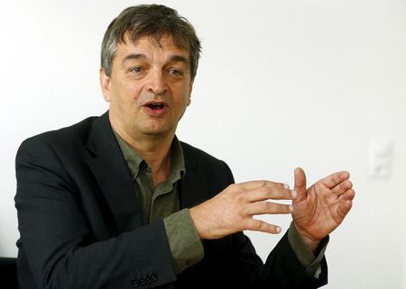 Former FIFA official Champagne speaks during a Reuters interview in Zurich