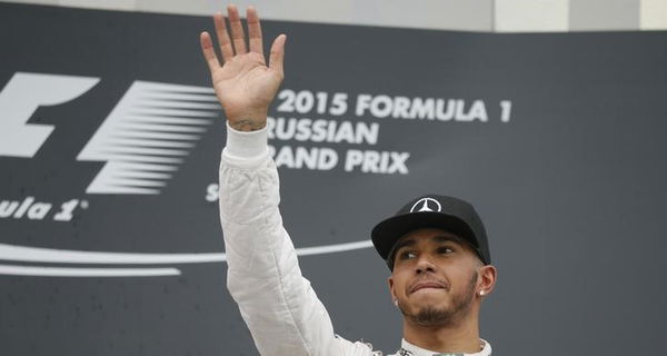 Mercedes&#8217; Hamilton of Britain waves after winning the Russian F1 GP in Sochi