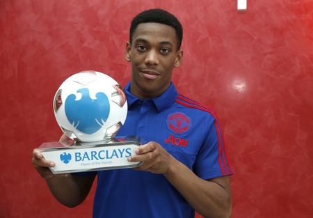 Football &#8211;  Manchester United Training Ground &#8211; 15/10/15 Manchester United&#8217;s Anthony Martial receives the Barclays Player of Month Award  Mandatory Credit: Action Images / Lee Smith Livepic