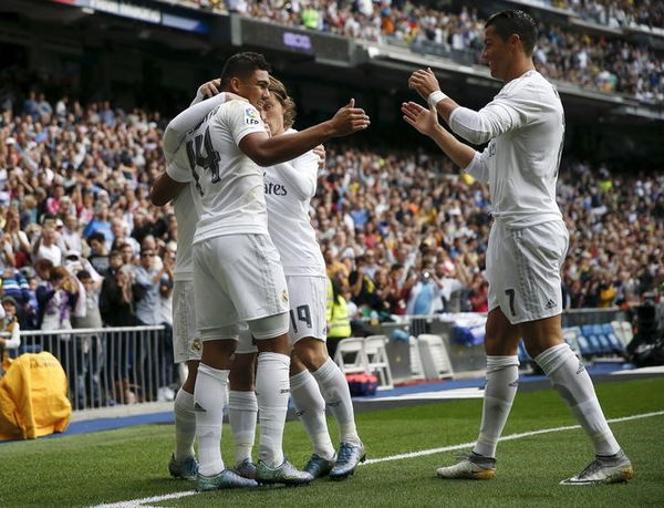 Real Madrid&#8217;s Isco Alarcon celebrates his goal against Las Palmas with teammates Casemiro, Luka Modric and Cristiano Ronaldo during their Spanish first division soccer match at Santiago Bernabeu stadium in Madrid, Spain