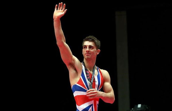 Britain&#8217;s Max Whitlock celebrates his gold medal from the pommel during the men&#8217;s apparatus final at the World Gymnastics Championships at the Hydro arena in Glasgow