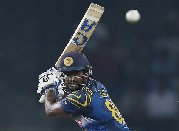 Sri Lanka&#8217;s Perera hits a boundary during the second One Day International cricket match against West Indies in Colombo