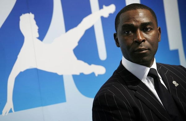 Former Manchester United striker Andy Cole attends a news conference in Hong Kong