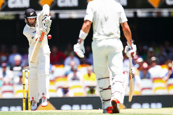 New Zealand batsman Kane Williamson defends a rising delivery , during the first cricket test match between Australia and New Zealand in Brisbane