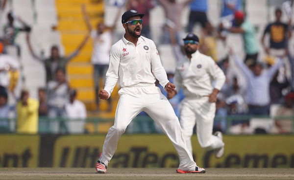 India&#8217;s captain Kohli celebrates the dismissal of South Africa&#8217;s du Plessis during the third day of their first cricket test match, in Mohali