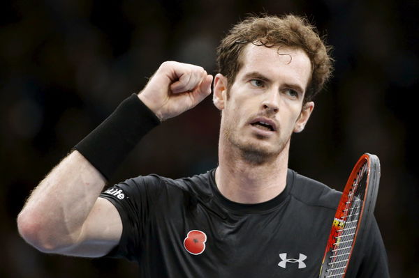 Murray reacts during his men&#8217;s singles final tennis match against Djokovic at the Paris Masters tennis tournament