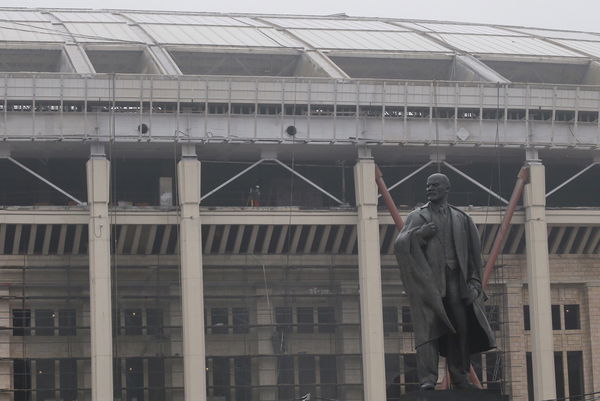 A monument of the Soviet state founder Vladimir Lenin is seen in front of the Luzhniki stadium in Moscow