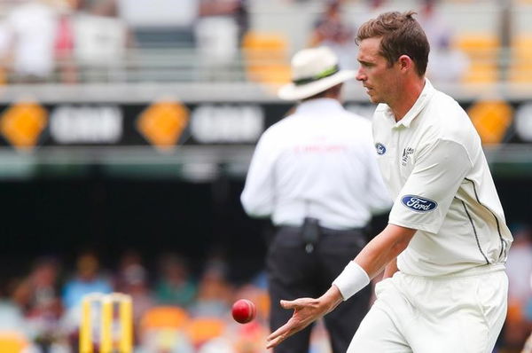 New Zealand bowler Tim Southee juggles the ball during the first cricket test match between Australia and New Zealand