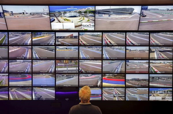 A man looks at the screens inside a control room of Formula One track in Sochi