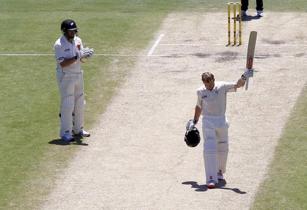 New Zealand&#8217;s Kane Williamson is applauded by team mate Ross Taylor as he celebrates reaching his century during the third day of the second cricket test match against Australia at the WACA ground in Perth, Western Australia