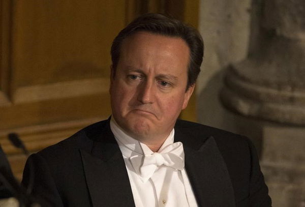 Britain&#8217;s Prime Minister David Cameron reacts during a speech at the Lord Mayor&#8217;s Banquet in London, Britain