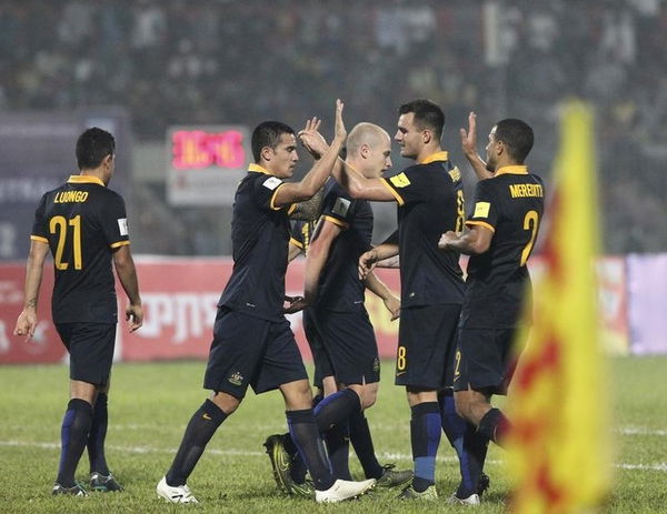 Australia&#8217;s Tim Cahill (2nd L) is congratulated after scoring a goal during their World Cup qualifier against Bangladesh in Dhaka