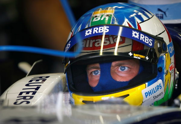 Williams Formula One driver Wurz sits in his car during the second free practice session for the European F1 Grand Prix at the Nuerburgring racing circuit