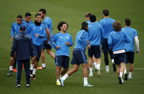 Real Madrid&#8217;s Marcelo smiles during a training session at the team&#8217;s training grounds outside Madrid