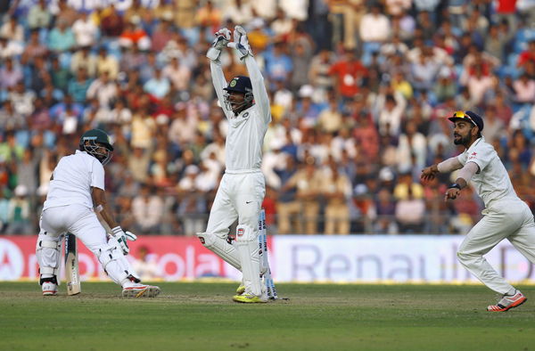 India&#8217;s captain Kohli and wicketkeeper Saha unsuccessfully appeal for the wicket of South Africa&#8217;s Tahir during the first day of their third test cricket match in Nagpur