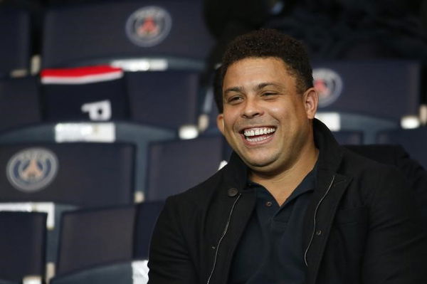 Former soccer player Ronaldo of Brazil attends the Champions League Group A soccer match where Paris Saint Germain face Real Madrid at the Parc des Princes stadium in Paris