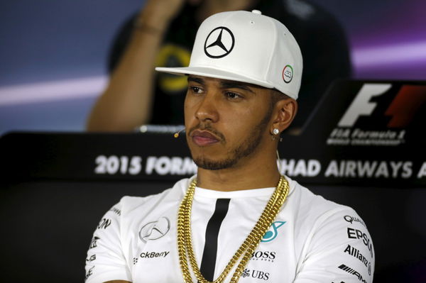 Mercedes Formula One driver Hamilton listens to journalist during driver&#8217;s news conference at the Yas Marina circuit before the start of the Abu Dhabi Grand Prix